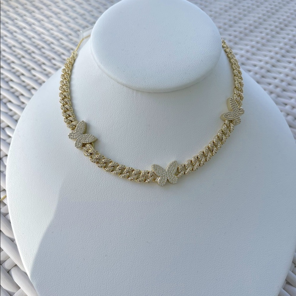 Beautiful brass gold coated necklace with diamond and butterfly detail